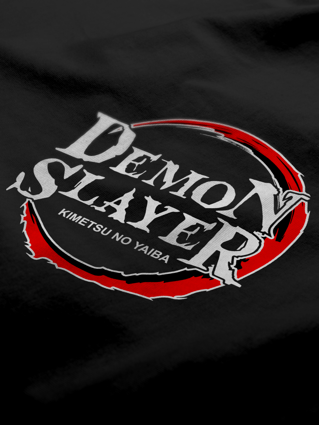 Close-up of Demon Slayer graphic on the front pocket of Men's Black Oversized Zip Hoodie